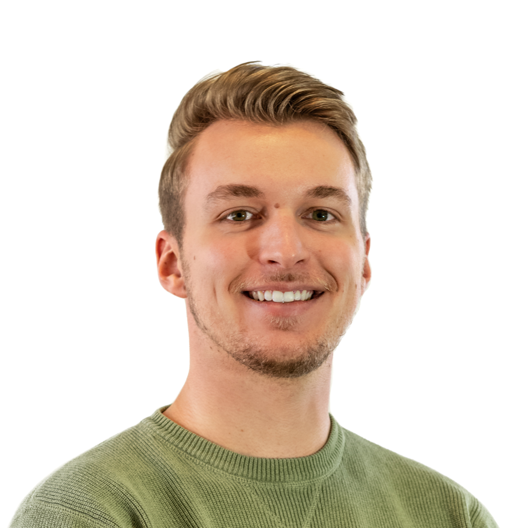 Headshot of Kyle Curtis with an big smile, and swooped hair.